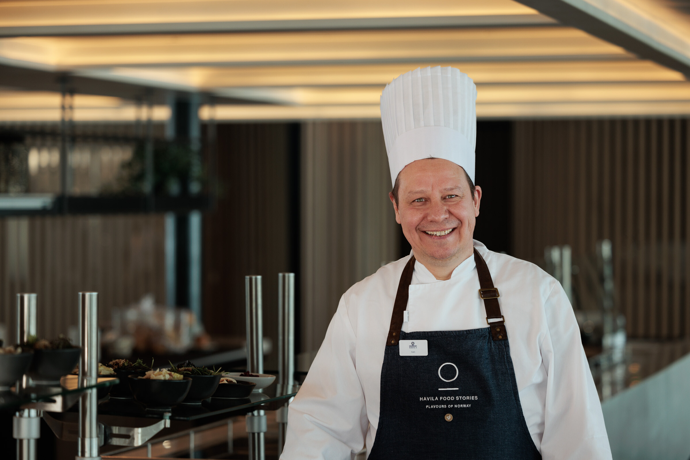 Chef smiling in the restaurant 