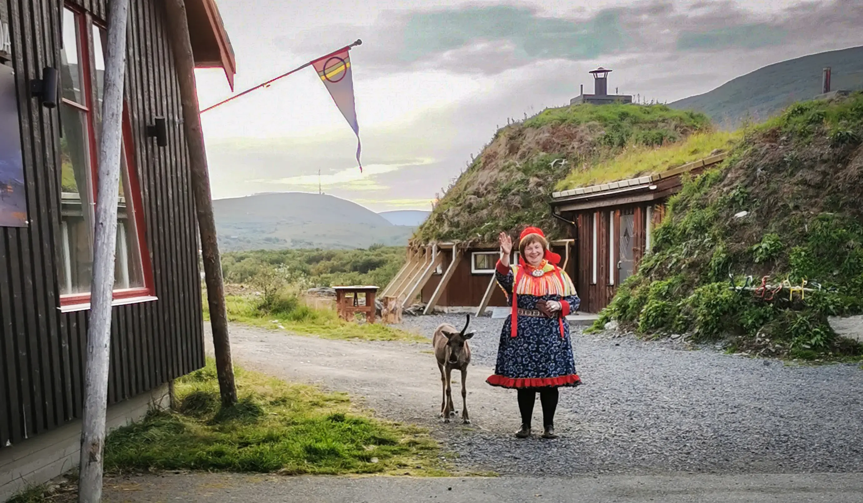 Sami woman with a reindeer